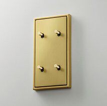 Jung ME12-25CK25 Abdeckung mit Kipphebel "Kegel", 2 x 2 Kipphebel, senkrecht, Serie LS 1912, Messing classic